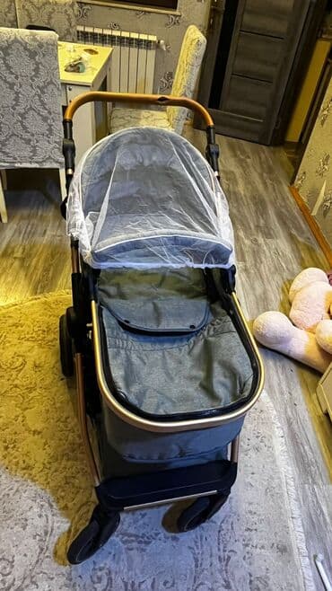 uşaq kurtkasi: Çıxarıla bilən beşikli araba, İşlənmiş — 1