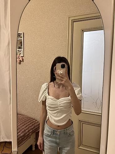 ağ canta: Ağ rəngli qısa top hec geyinilmiyib standart olcu,etiketde L dir amma — 1