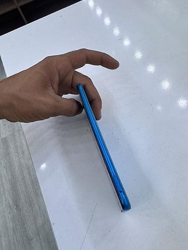 maxfone max 9: Xiaomi Mi 9, 32 GB, rəng - Göy, 
 İki sim kartlı — 4