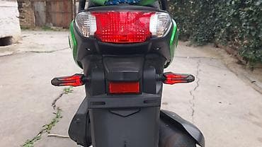 hunday disk teker: Yaşıl rəngli şəhər skuterı – ZigZag brendli Xüsusiyyətlər: - Kompakt — 3