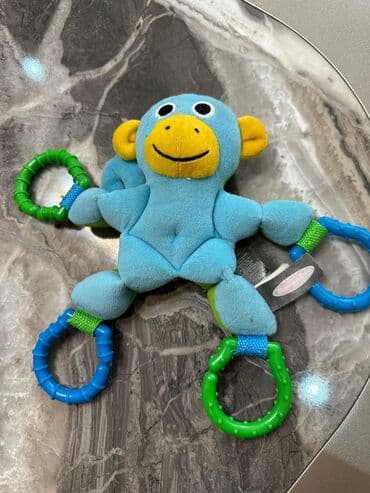 uşaq kolyaskaları: Usaq oyuncagi.Kalyaskadan ve besikden asilir.Her halqasindan asmaq — 1