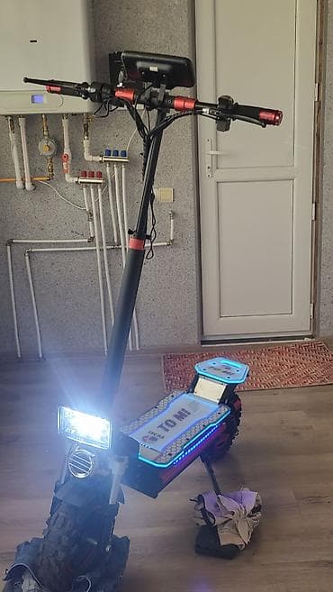 ucuz gitara: Elektrik skuter – TOMI brendi Xüsusiyyətlər: - Güclü ikili — 1