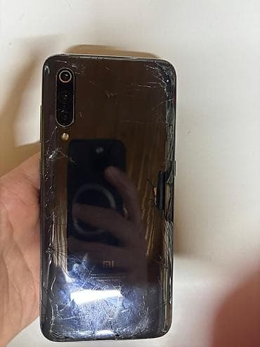 mi mix 4: Xiaomi Mi 9, 64 GB, rəng - Qara, 
 Qırıq — 1