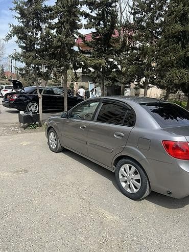 kia serato 2008: Kia Rio: 1.4 l | 2010 il Sedan — 4