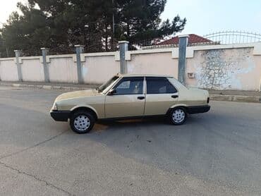 avto 312: Model: Sedan, 4 qapı Kuzov növü: Kompakt sedan Rəng: Açıq qızılı/bej — 1