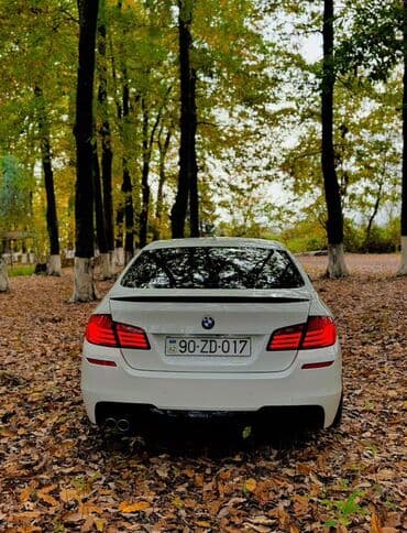 aston martin dbs 6 v12: BMW 5 series: 2 l | 2011 il Sedan — 2