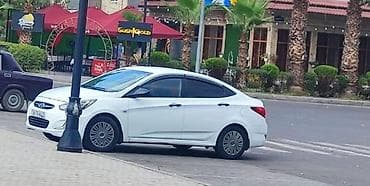 Hyundai Accent sedan, ağ rəng. - Kuzov: 4 qapılı sedan, aerodinamik