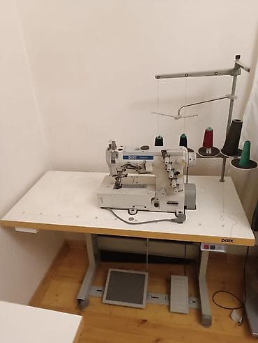bas masini: Peçat tikiş üçün sənaye overlok maşını – PFAFF 335 tipli post-bed — 1