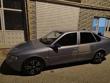 teker niva: Model: Opel Vectra B sedan Rəng: Mavi metalik Kuzov: 4 qapı, tünd — 1