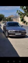 mersedes c 230: BMW 735: 3.5 l | 1998 il Sedan — 1
