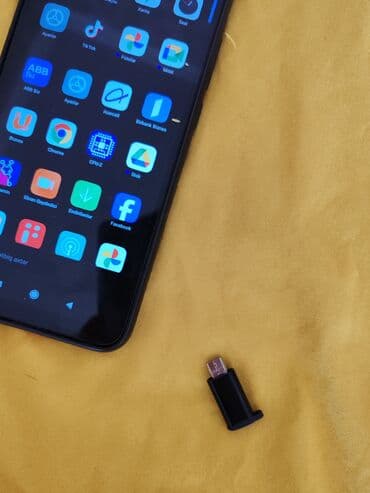 xiaomi mi 9 se qiymeti bakida: Xiaomi Mi 9T, 64 GB, rəng - Narıncı, 
 İki sim kartlı, Barmaq izi — 3