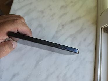 islenmis mator: IPhone 16 Pro, 128 GB, Blue Titanium, Face ID — 3