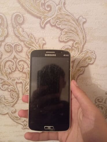 islemis telefonlar: Samsung Galaxy Grand 2, 16 GB, rəng - Qara, İki sim kartlı — 1