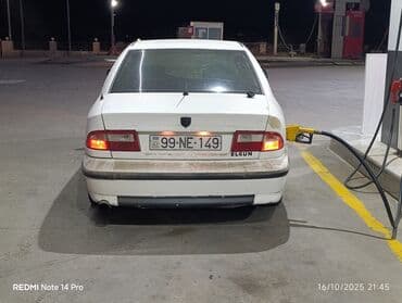 maşın adları: Ağ rəngli sedan – İran istehsalı Samand/Peugeot platformalı model — 2