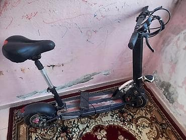 Электросамокаты: Elektrik skuter – oturacaqlı, yığcam şassi Xüsusiyyətlər: - Oturacaq — 1