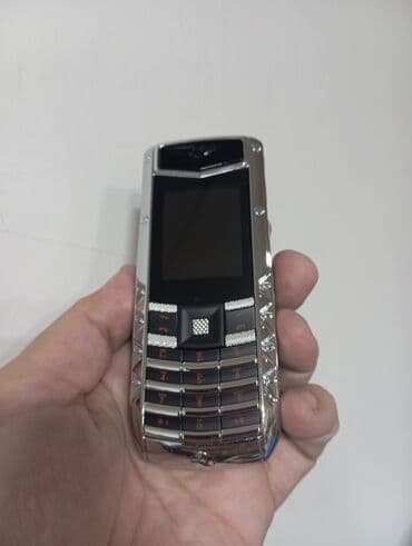 телефон fly cirrus: Vertu Signature Touch, 4 ГБ, цвет - Серебристый, Кнопочный — 4