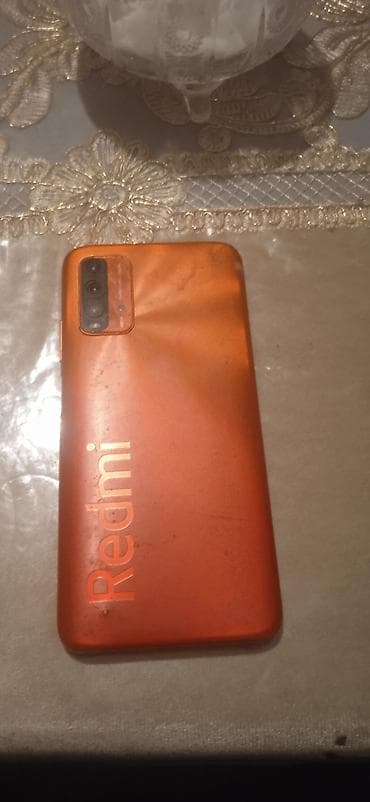 Xiaomi Redmi smartfon – narıncı rəng - Arxa tərəfdə iri “Redmi”