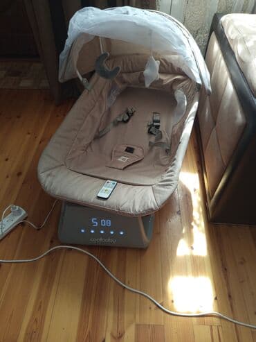 uşaq yellənçəyi: Coolbaby markalı elektrik uşaq yelləncəyi, ağ rəngdədir. Bu — 3