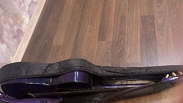 gibson gitara: Akustik gitara – kəsikli (cutaway) korpuslu, 6 simli, tünd bənövşəyi — 3