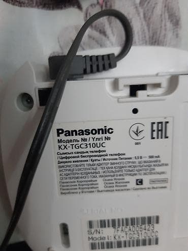 Panasonik"KX TGC 310 UC сине белый,журнал 50 вызовов,время работы 16 — 2
