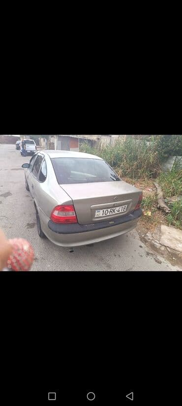 masinim var ag rengi: Opel sedan – komfortlu və praktik gündəlik minik avtomobili. - Kuzov — 5