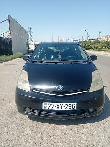 Toyota Prius (2-ci nəsil) hibrid hetçbek - Rəng: qara - Kuzov: 5