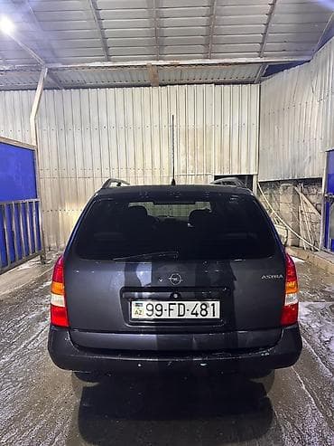 stanqa: Opel Astra Caravan (universał) – qara rəng, 5 qapı, geniş baqajlı ailə — 8