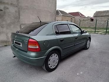 formula tekerler: Opel Astra: 1.8 l | 1999 il 250000 km Sedan — 6