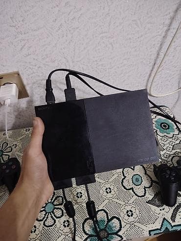 iphone 15 pro max çakma: Sony PlayStation 2 Slim oyun konsolu - Model: PS2 Slim (SCPH — 4
