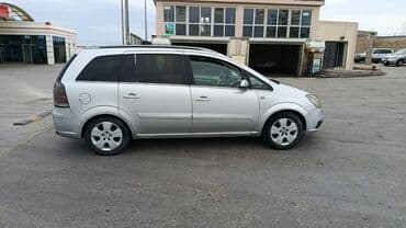 qubada ucuz avtomabiller: Gümüşü rəngdə olan Opel Zafira miniveni. Geniş salonu və baqajı var — 1