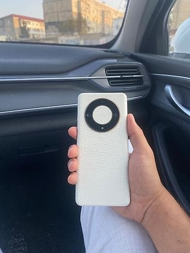 Məhsul: Smartfon Xüsusiyyətlər və təsvir: - Arxa dizayn: Ağ rəngli