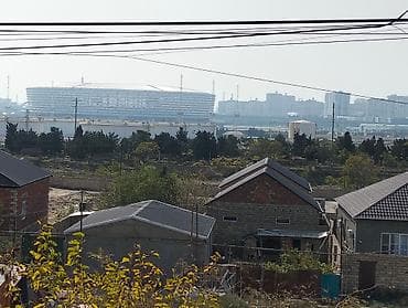 Sabuncuda olimpiya stationun arxa tereflerinde uca yerden ev satılır