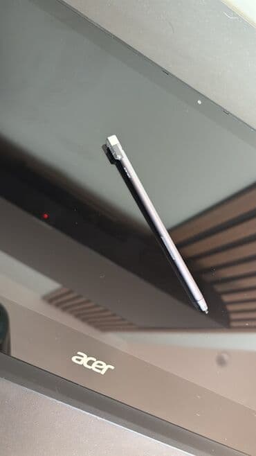 Printerlər: Acer noutbuku – gümüşü korpus, yüngül və nazik dizayn. Acer Prosesor — 5