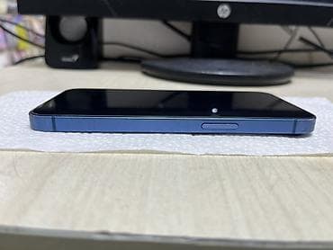 telefon a 72: IPhone 13, Mavi, Face ID — 6