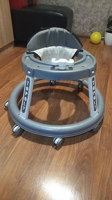 Uşaq yeriyən “Topoly” gəzdirici - Dairəvi şassi və çoxsaylı təkərlər