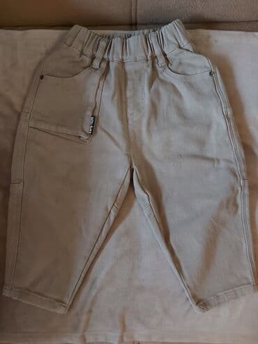 Uşaq şalvarı – bej rəngdə, rahat və praktik model. Xüsusiyyətlər: -