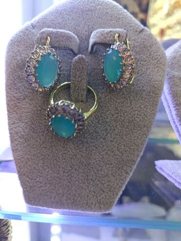 sebeke qizil sirqalar: Zərgərlik dəstləri – zövqlü aksesuar seçimi 1) Yaşıl daşlı çiçək — 10