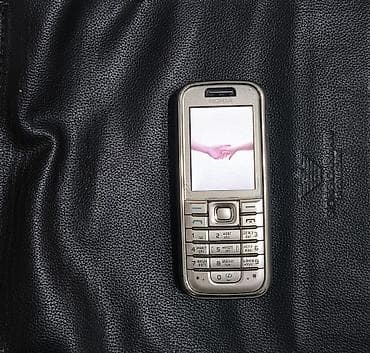 Nokia < 2 GB Memory Capacity, rəng - Gümüşü, Düyməli — 2