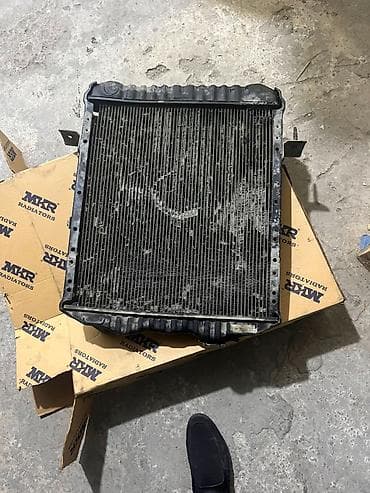 Radiatorlar: İsuzu npr 66 mstkalı maşının radiatorudur usdençıxmadır tamarginal dı — 2
