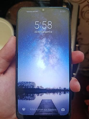 Xiaomi Redmi smartfon - Model: Redmi (arxa hissədə “Redmi” loqosu — 2