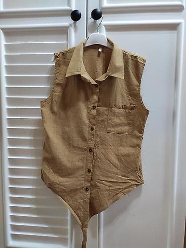Qadınlar üçün qolsuz köynək-tunik - Rəng: karamel/qəhvəyi - Material at lalafo.az Qadınlar üçün qolsuz köynək-tunik - Rəng: karamel/qəhvəyi - Material