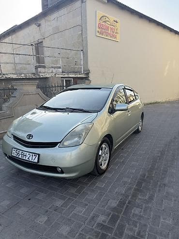 Toyota Prius (2-ci nəsil) hibrid hetçbek - Gümüş/boz rəngli kuzov, 5