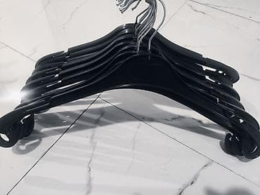 ev dəstləri: === PART 1: TEXTUAL DESCRIPTION === Bu məhsul, geyimlərin səliqəli — 1