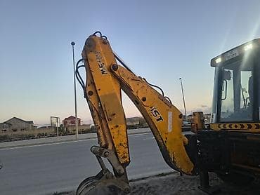 ekskavator qiymetleri: MST qazma-yükləyici ekskavator - Arxa qazma və ön yükləyici kürək — 8