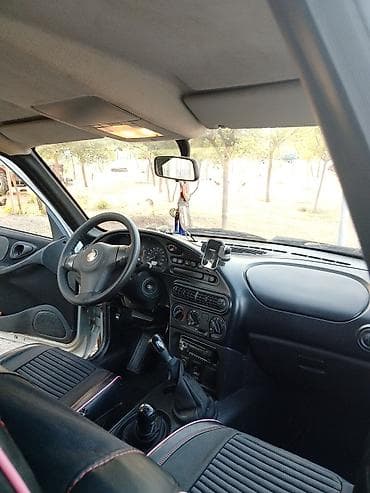 panel ortuyu: Chevrolet Niva: 1.7 l | 2012 il 213000 km Krossover — 4