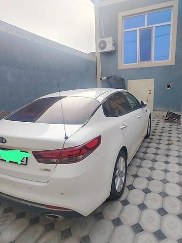 vaz 2106 mator: Kia K5 sedan – ağ rəng, 4 qapı, ön çəkiş. Geniş və komfortlu salonlu — 3