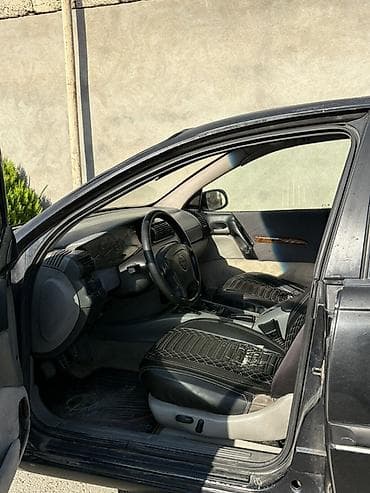 vaz 2107 abilsofka: Opel Omega B, sedan, qara rəng. Texniki və funksional xüsusiyyətlər — 4