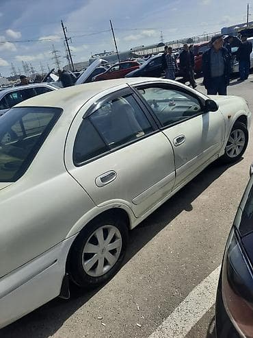 megan 3: Nissan Sunny: 1.3 l | 2006 il Sedan — 7
