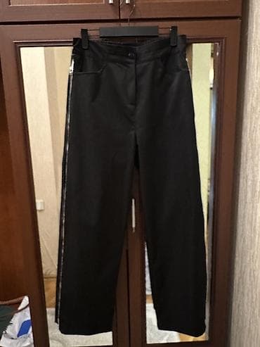 Paltolar: Qara rəngdə geniş kəsimli qadın şalvar. Yan hissələrdə başdan-başa — 2