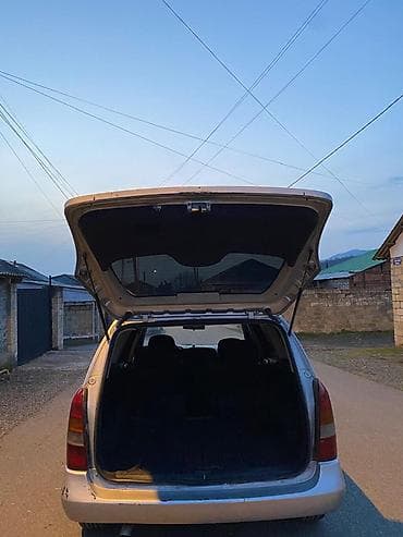 turbo az gazel: Opel Astra Caravan (universaI) – gümüşü rəng Xüsusiyyətlər: - Kuzov — 6